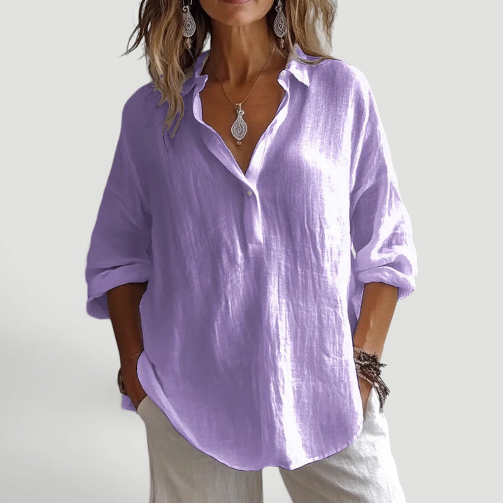 Chic modern women's blouse with a loose fit. Lightweight casual top for effortless style & comfort.