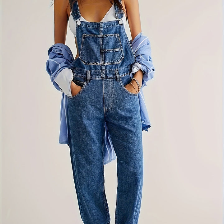 White women's loose fit denim overall, casual and comfortable. Ladies dungarees for versatile everyday wear.