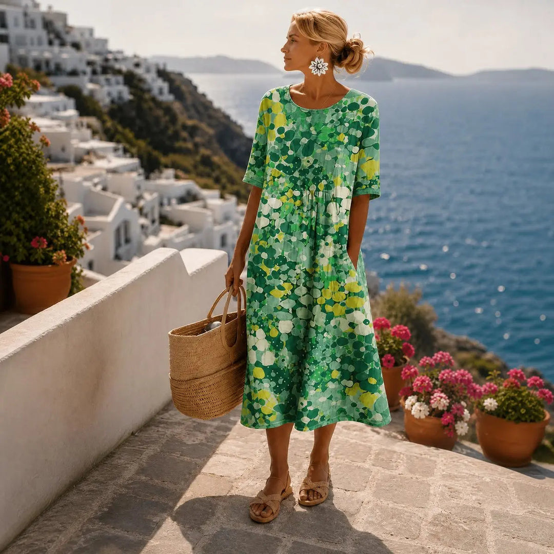 Vibrant floral print midi dress for women, loose fit & comfortable, perfect short sleeve summer casual or holiday wear.