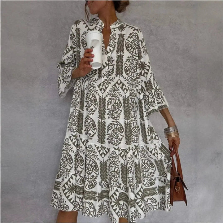 Boho style floral print tunic dress for women, loose fit, ideal for beach or warm weather.