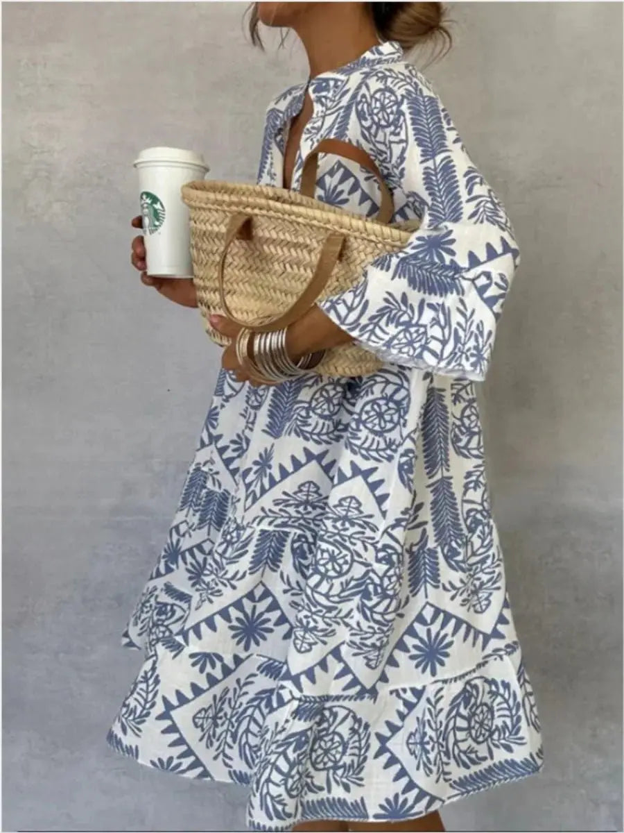 Chic women's floral print short sleeve tunic dress, loose fit, ideal for summer and travel.