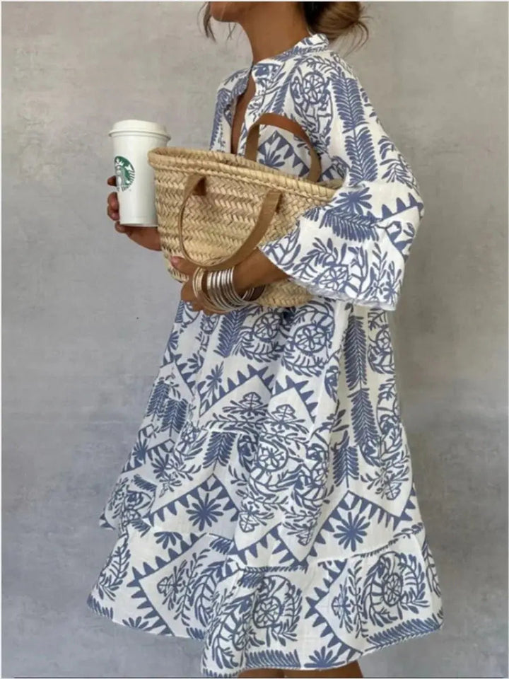 Chic women's floral print short sleeve tunic dress, loose fit, ideal for summer and travel.