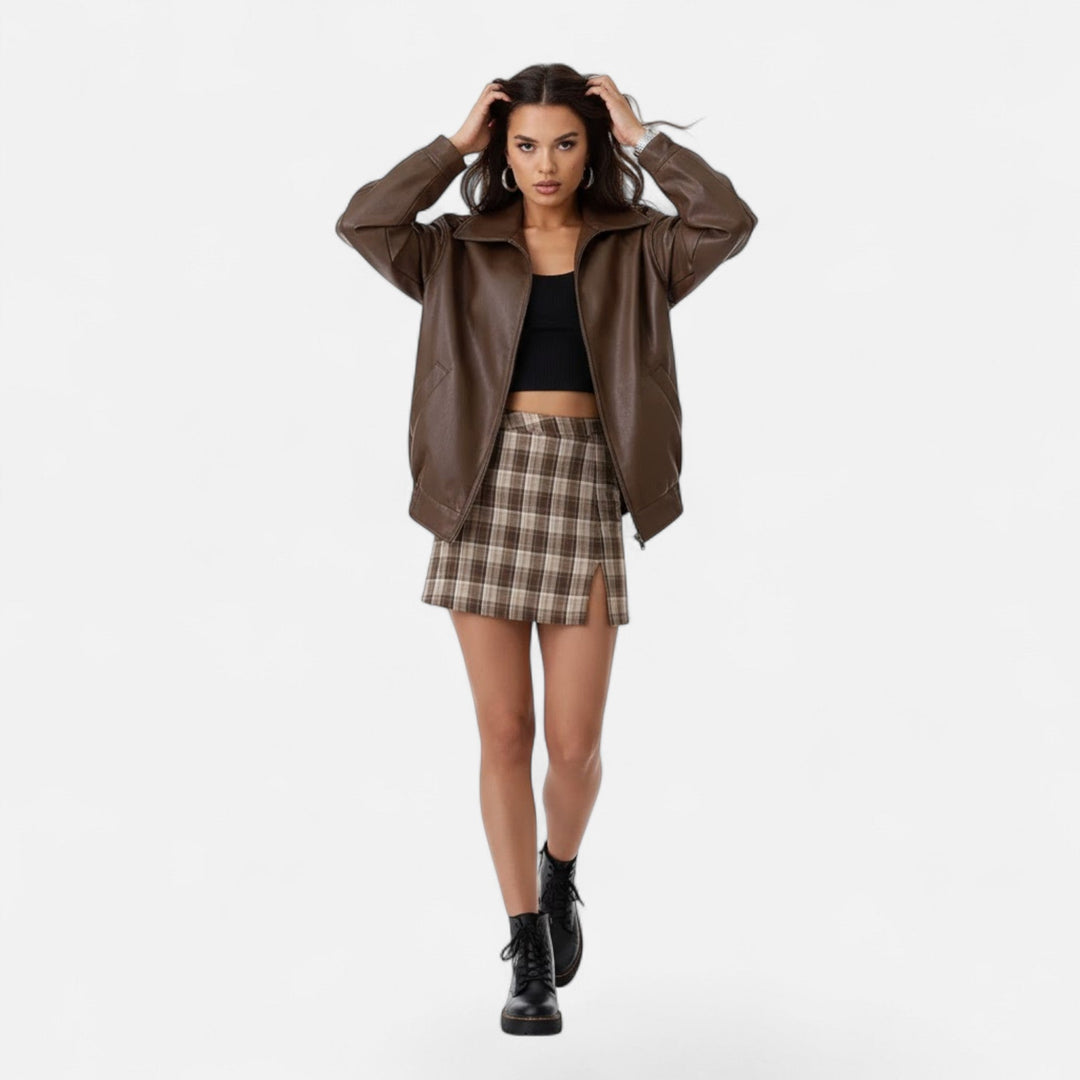Fashionable women's loose fit moto jacket, enhancing any outfit with its unique casual and chic design.