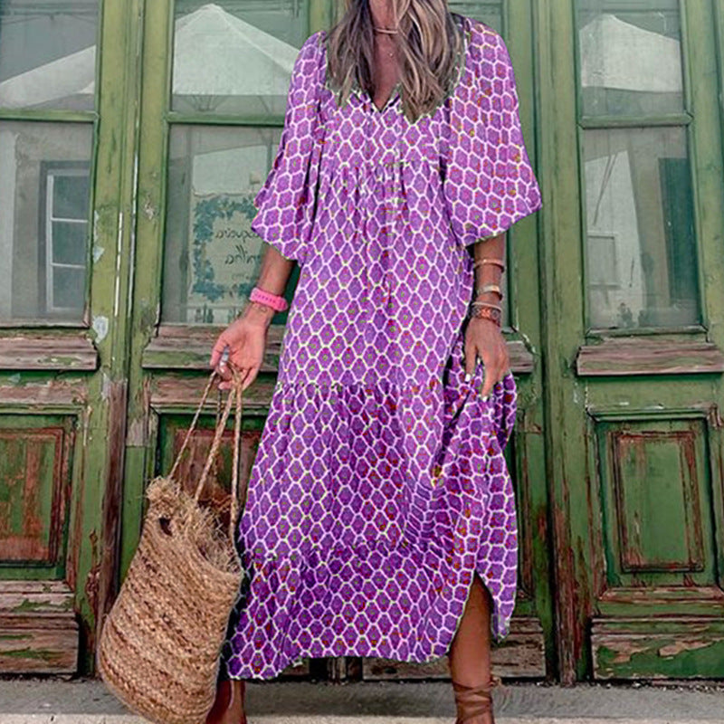 Women's loose fit printed ruffled midi dress in motion, showcasing comfortable drape & vibrant print.