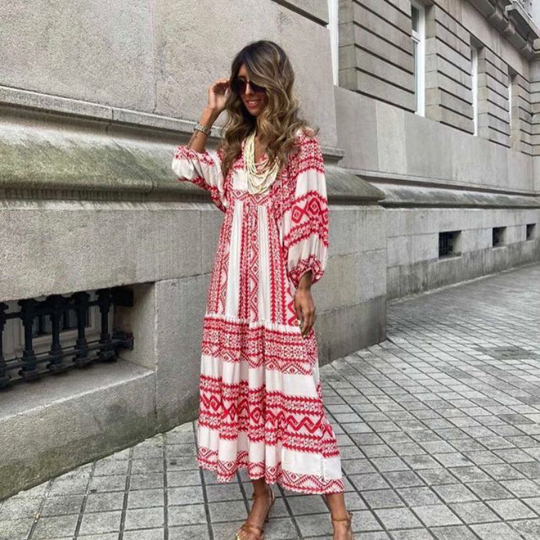 Women's printed ruffled loose fit dress, three-quarter sleeves, styled for a chic casual day.