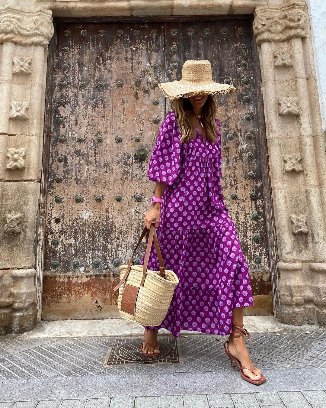 Close-up of women's printed loose fit dress, highlighting delicate ruffles & vibrant pattern.