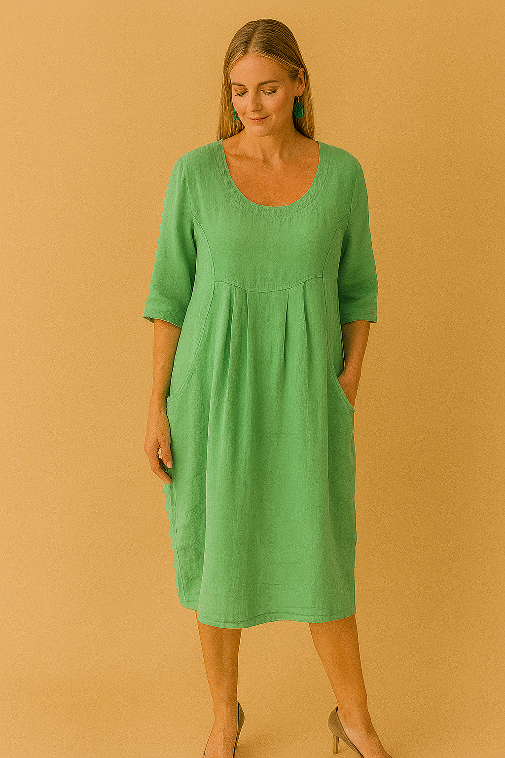 Everyday women's loose fit t-shirt dress in a solid color. Round neck, short sleeves, knee-length cut with pockets.