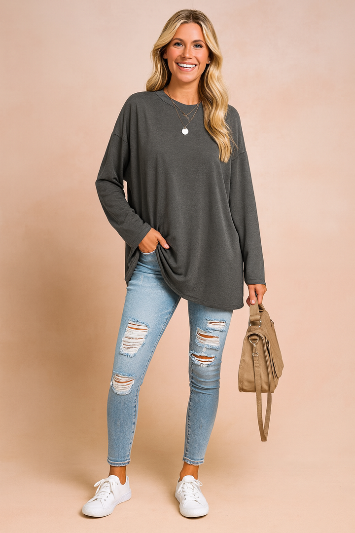 Relaxed fit women's oversized sweater, offering ultimate comfort and versatile everyday style.