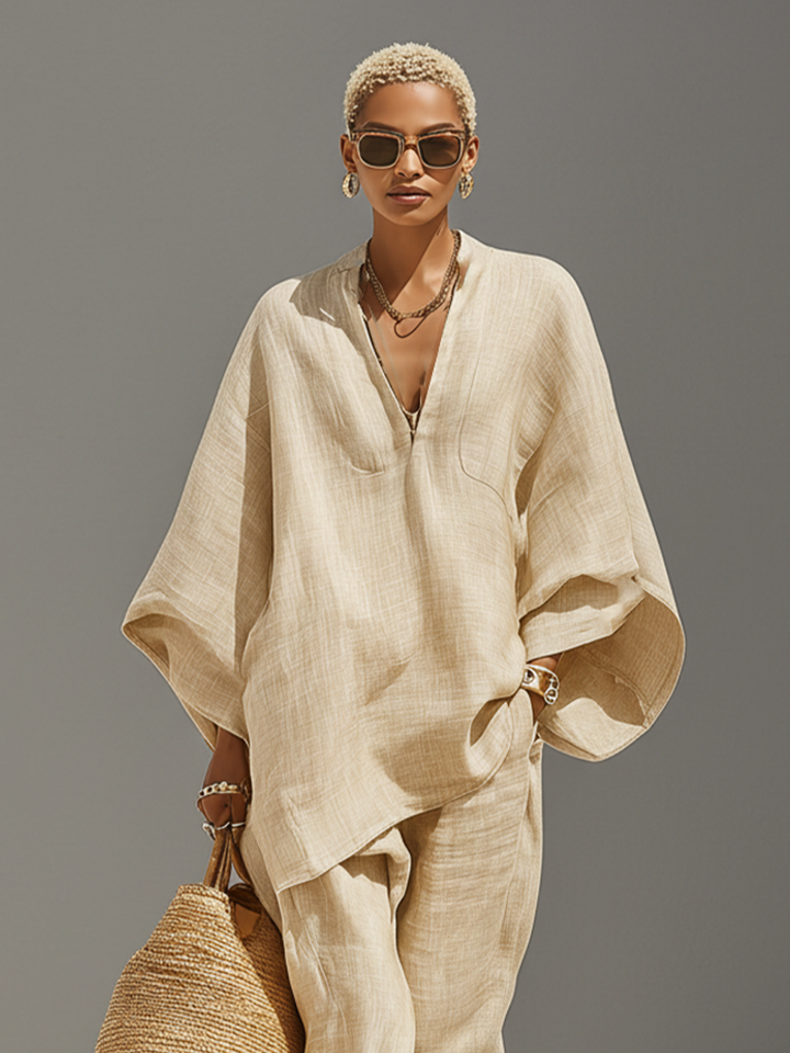 Comfy women's two-piece set: loose fit notched top & stylish tapered pants, ideal for loungewear.