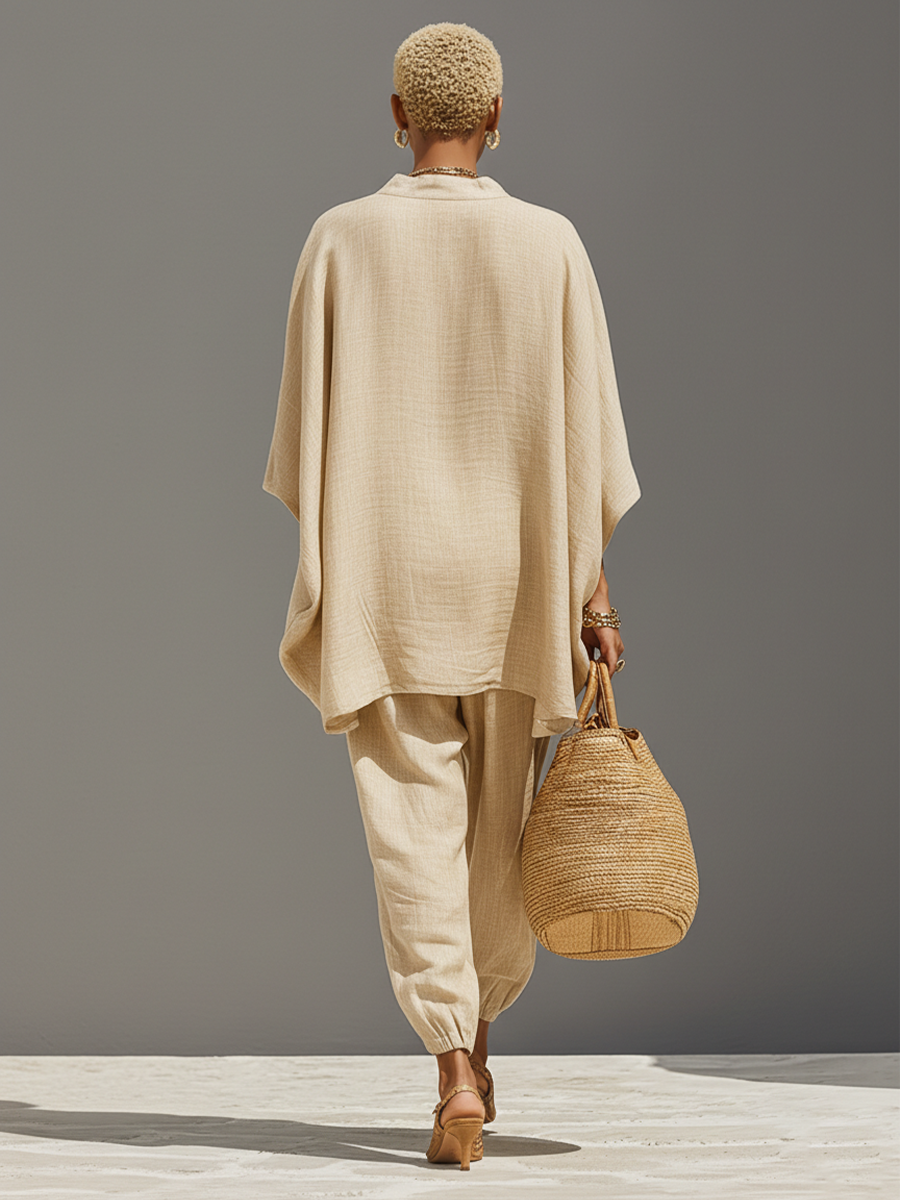 Trendy women's loose fit loungewear set, oversized notched top & tapered pants for ultimate comfort.