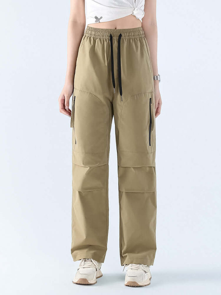 Stylish women's rain pants, loose straight fit, offering waterproof protection & comfort for all-weather adventures.