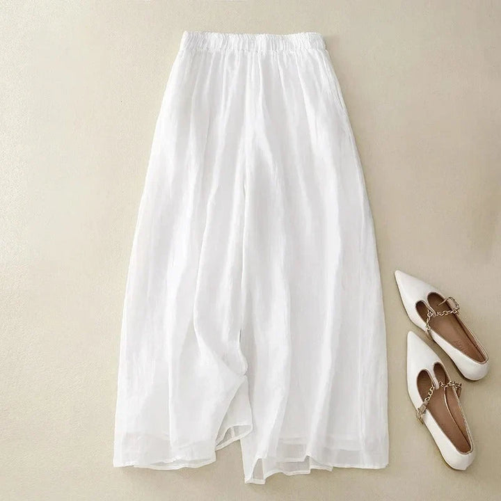 Lightweight women's loose wide-leg cropped pants, offering cool comfort & chic style for warm spring & summer.