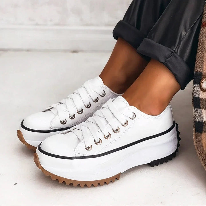 Chunky sole low-top platform sneakers for women. Comfortable lace-up design, perfect for daily walking.