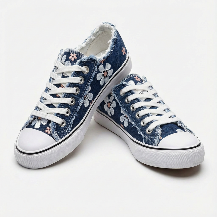 Fashionable women's low-top casual footwear, floral embroidered with a unique frayed edge design.