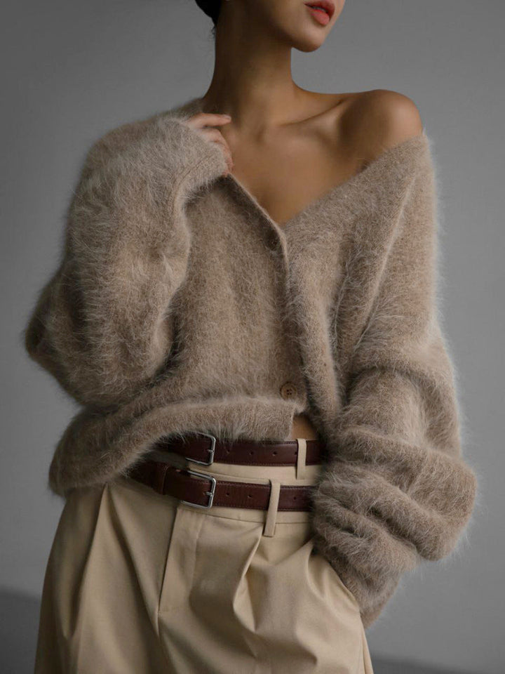 Lightweight women's sweater cardigan, a must-have versatile fashion piece.