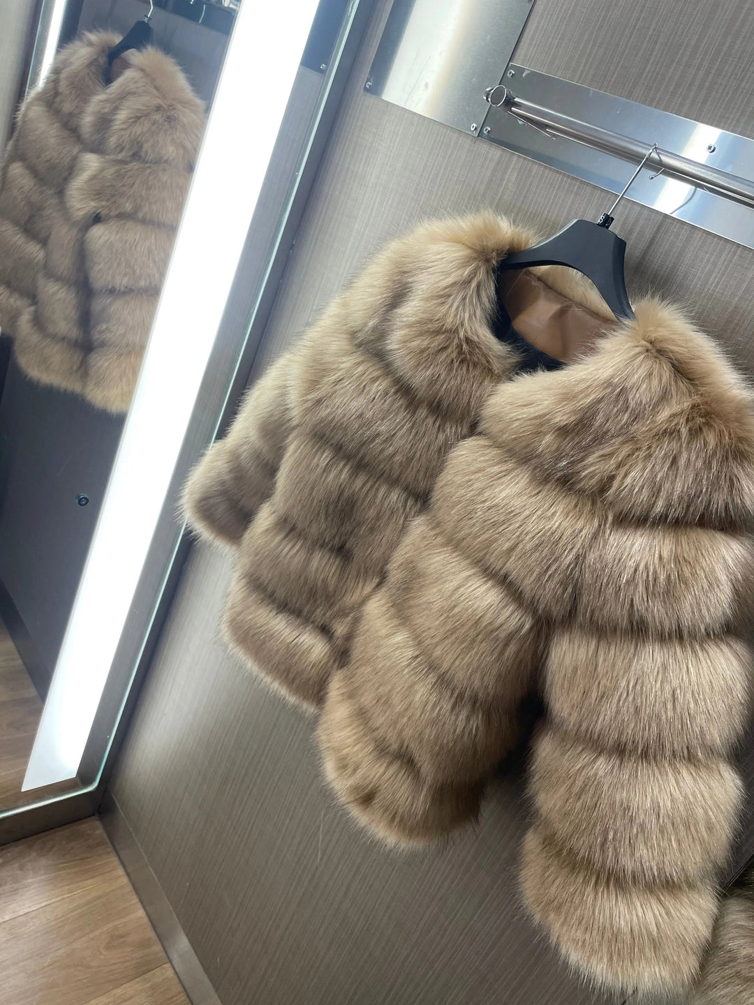 Premium women's padded winter jacket. Luxurious, warm outerwear for elegant & modern styles.