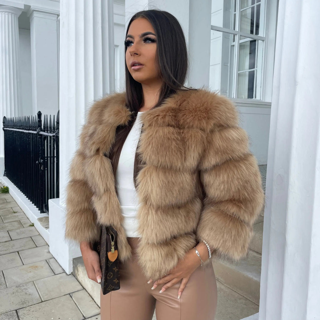 Luxurious women's winter coat, padded for elegant warmth & ultimate cozy comfort in cold weather.