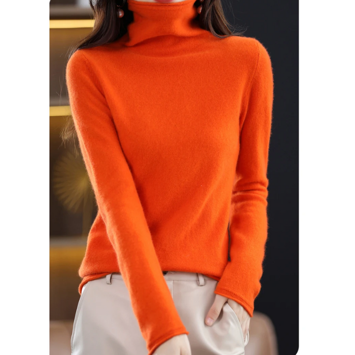 Close-up of the luxurious texture of the women's roll neck sweater