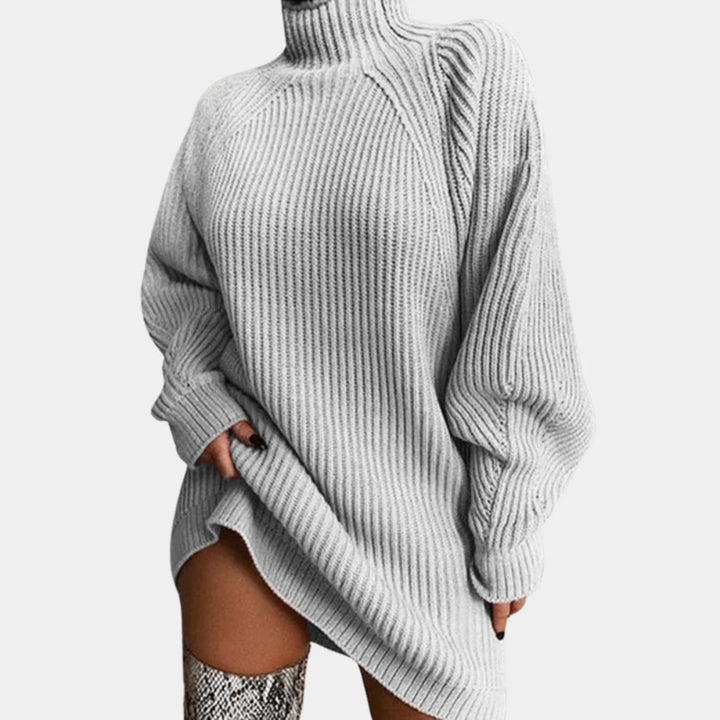 Elegant long sleeve turtleneck top for women, offering a soft and warm feel.