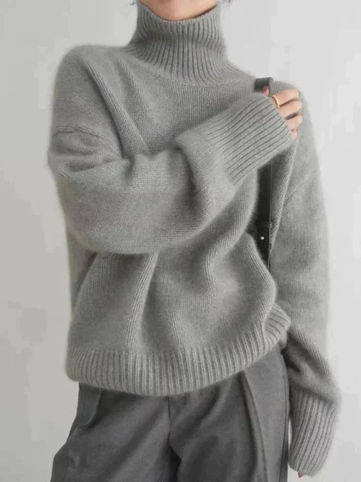 Casual chic women's sweater with a comfortable turtleneck design, ideal for winter.
