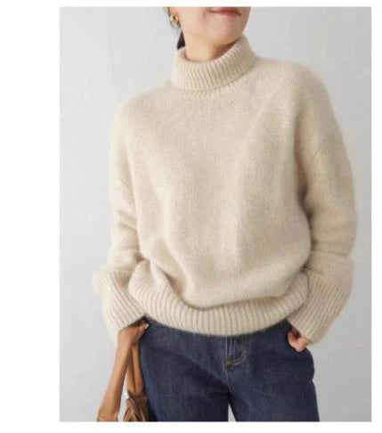 Women's luxurious Amelia turtleneck sweater in soft knitwear, a versatile wardrobe staple.