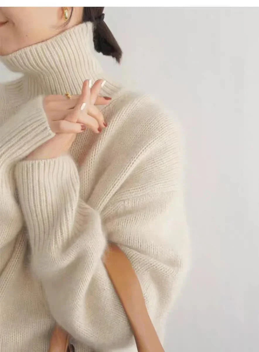 Close-up of the elegant Amelia women's turtleneck sweater, showcasing its cozy knit texture.