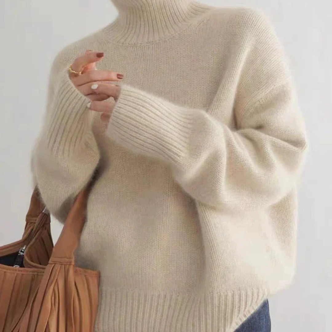 Model wearing the Amelia long sleeve turtleneck sweater, perfect for winter fashion.