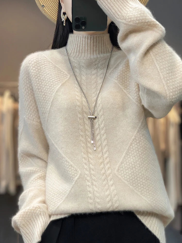 Women's luxurious cashmere roll neck jumper with classic cable knit detailing.