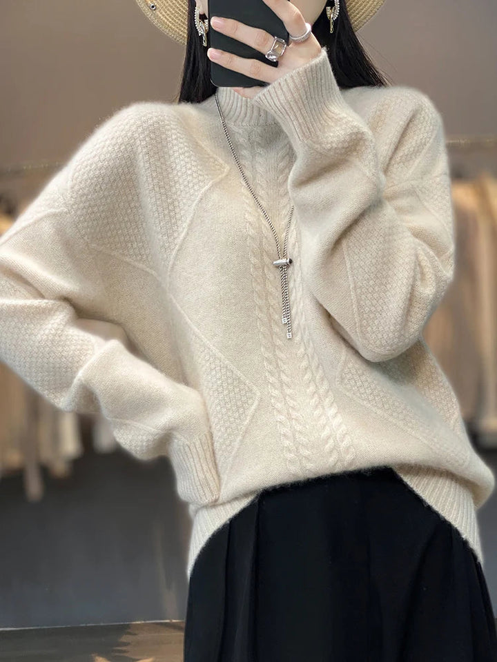 Cozy and warm women's cable knit sweater in soft cashmere with a stylish roll neck.