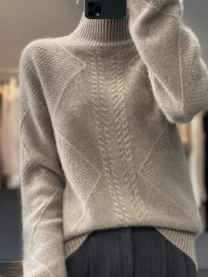 Model wearing a comfortable women's cashmere roll neck jumper in a winter setting.