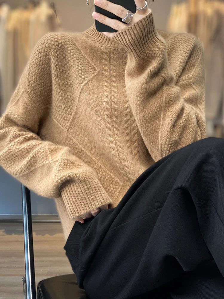 Cozy women's sweater crafted from premium cashmere, featuring a timeless roll neck design.