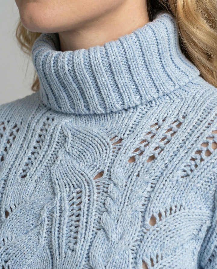 Soft warmth in a women's beige luxury cashmere sweater, elegant and versatile