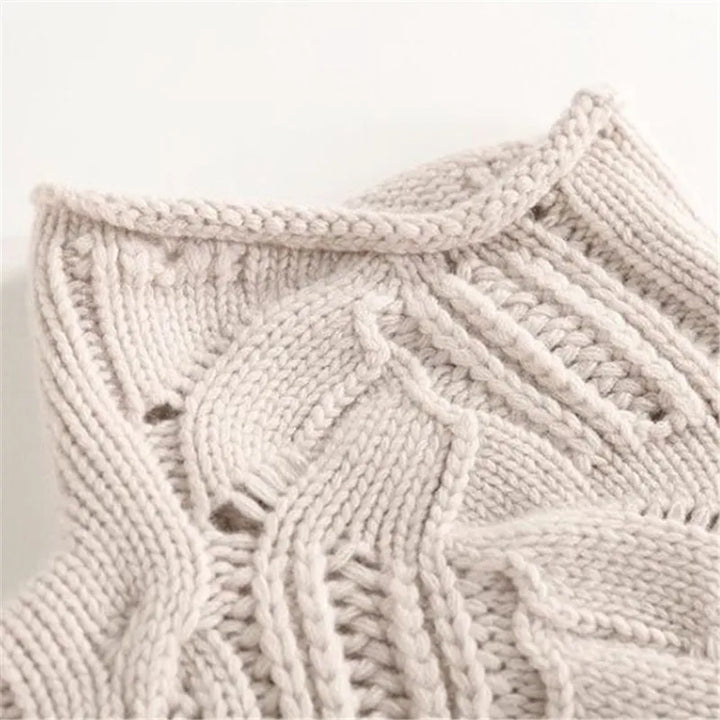 Luxury women's blue cashmere sweater, featuring soft texture and modern design