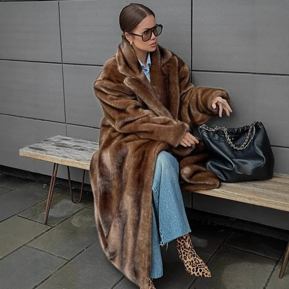 Women's luxury brown faux fur coat with elegant fit and warm lining
