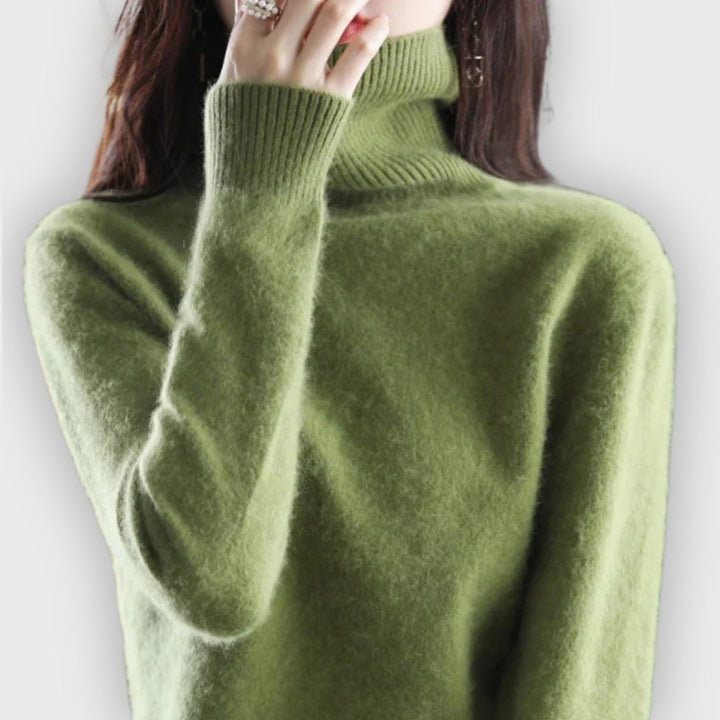Cozy and soft, this women's cashmere turtleneck sweater is a must-have for winter.