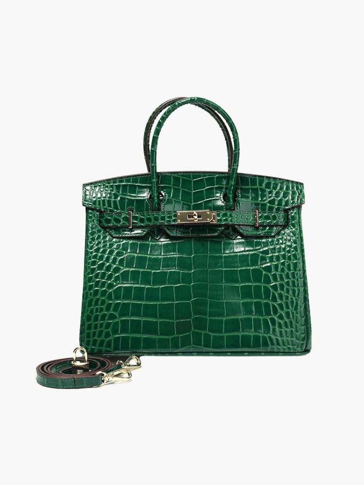 Elegant gold hardware complements this cognac leather tote