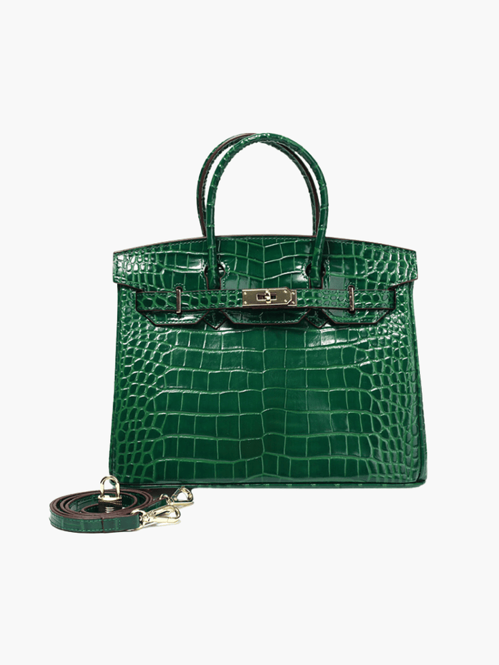 Elegant gold hardware complements this cognac leather tote