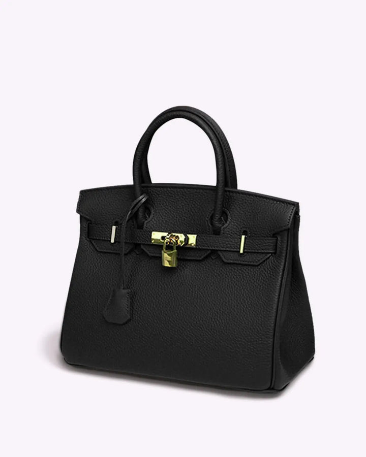 Elegant cognac leather handbag with gold hardware for women