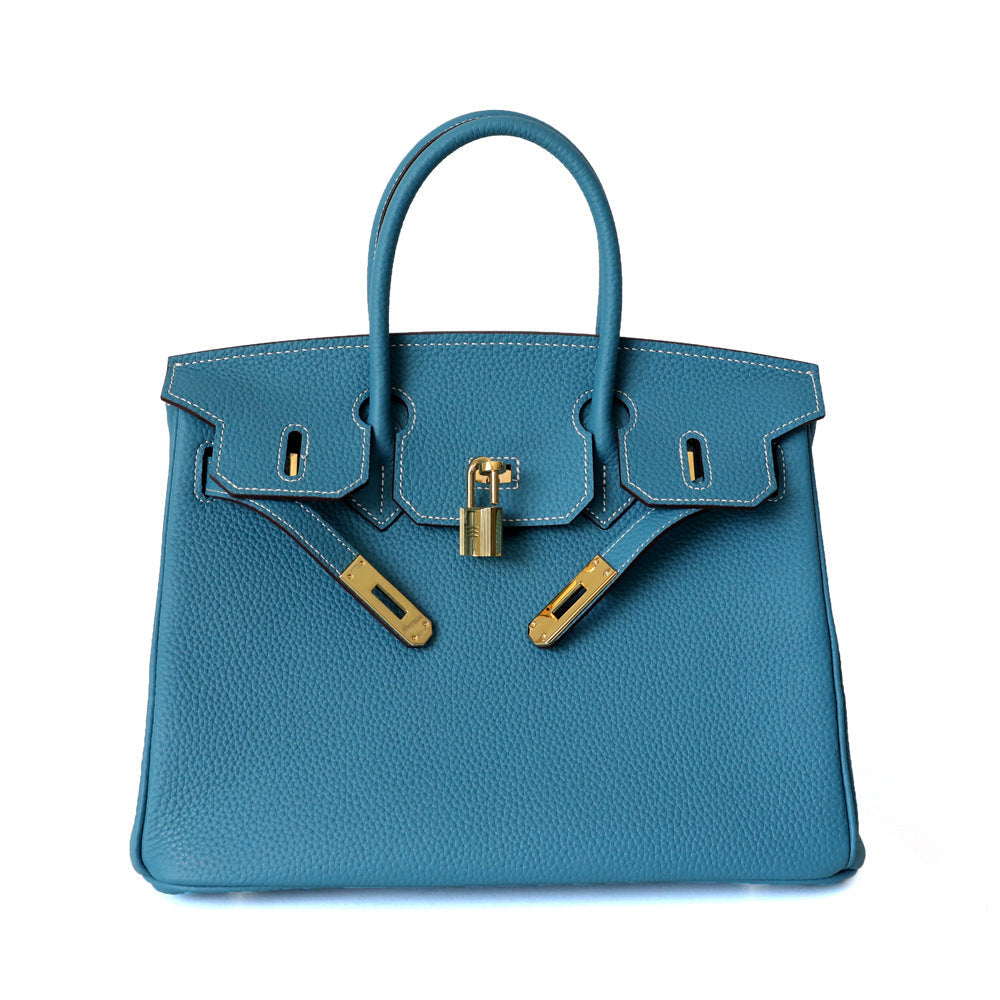 Functional and chic cognac leather top handle handbag