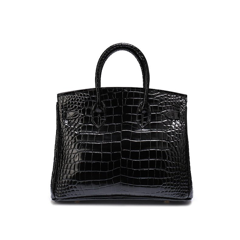 High-end women's handbag crafted from genuine cognac leather