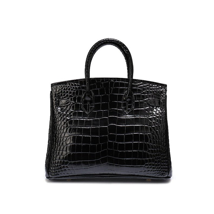 High-end women's handbag crafted from genuine cognac leather