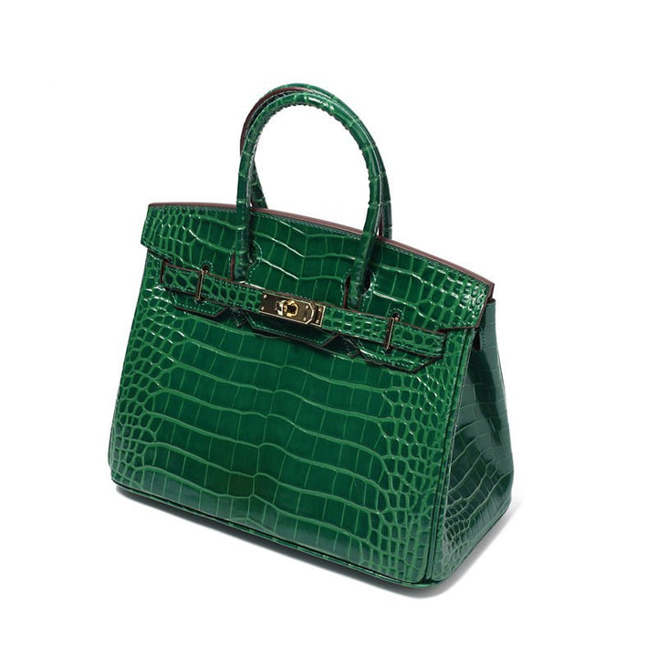 Genuine cognac leather bag with refined gold hardware