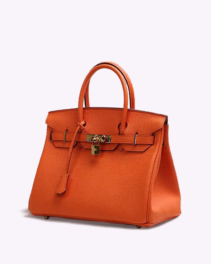 Luxury top handle bag made of premium genuine leather, cognac