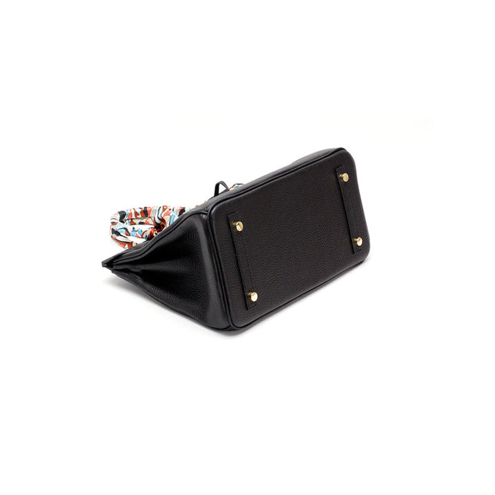 Women's luxury bag: genuine cognac leather, elegant design