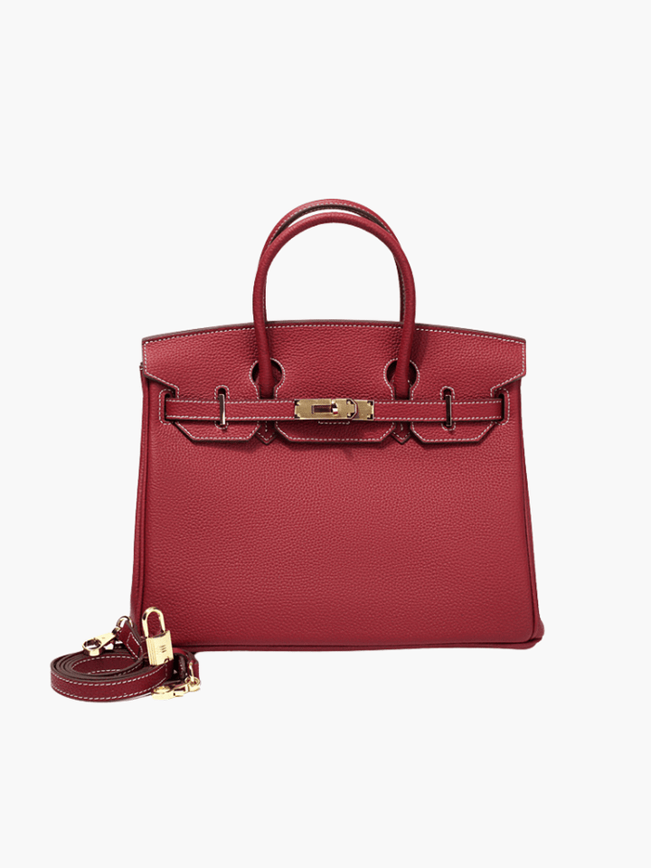 Designer cognac leather bag with elegant gold accents