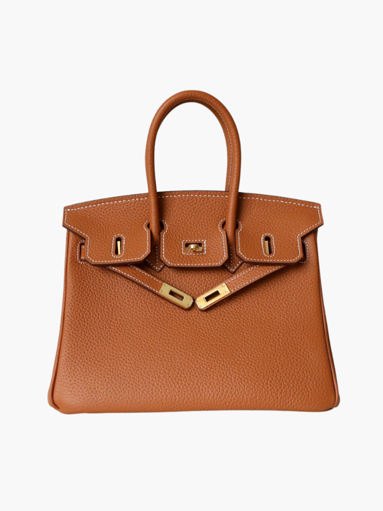 Sophisticated cognac top handle purse for a luxurious look