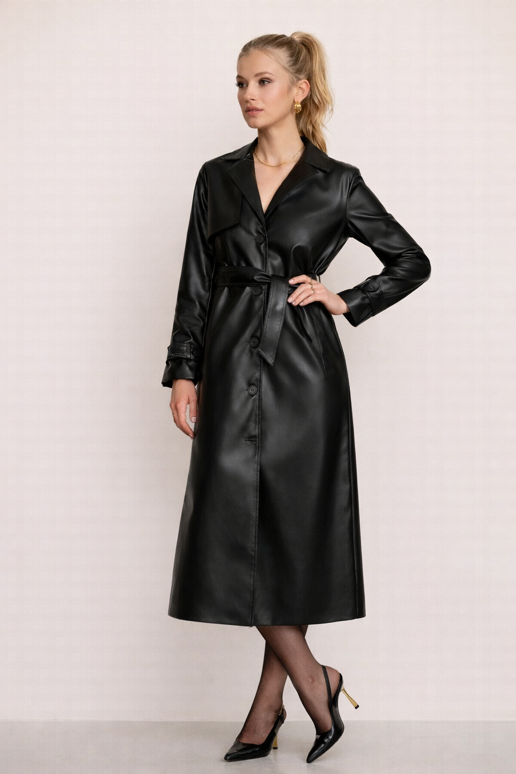 Stylish women's button-up summer jacket. Luxury leather-look and lightweight, complete with an elegant belt.