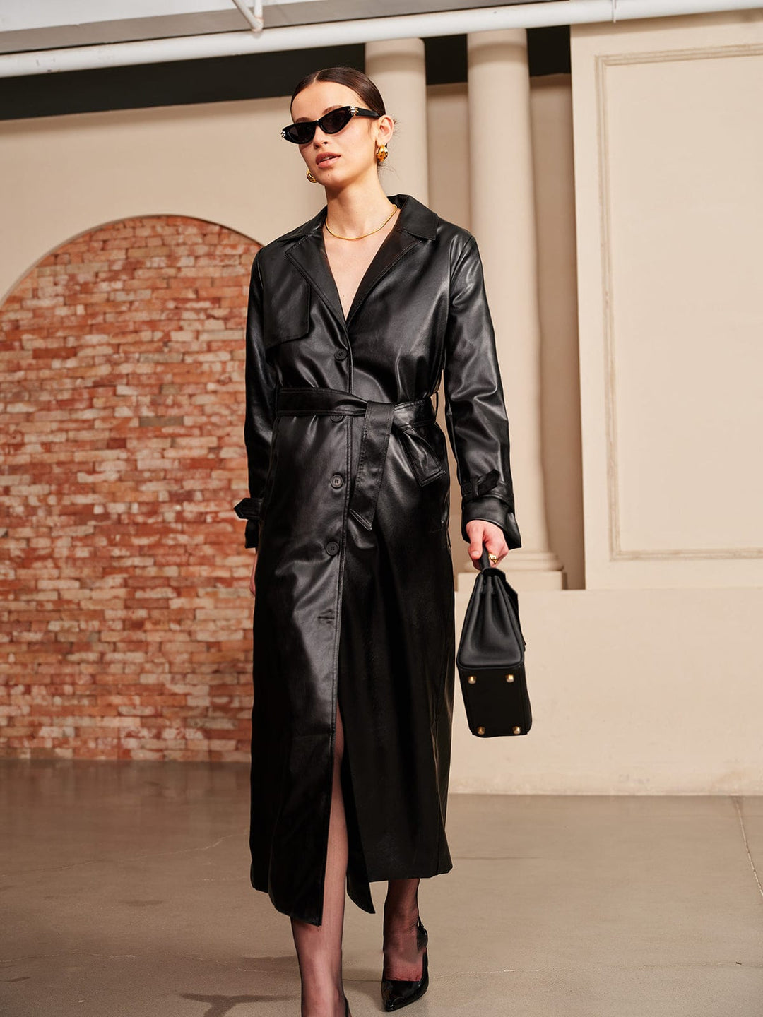 Versatile women's black summer jacket, lightweight leather-look with belt. Perfect for elegant & casual chic.