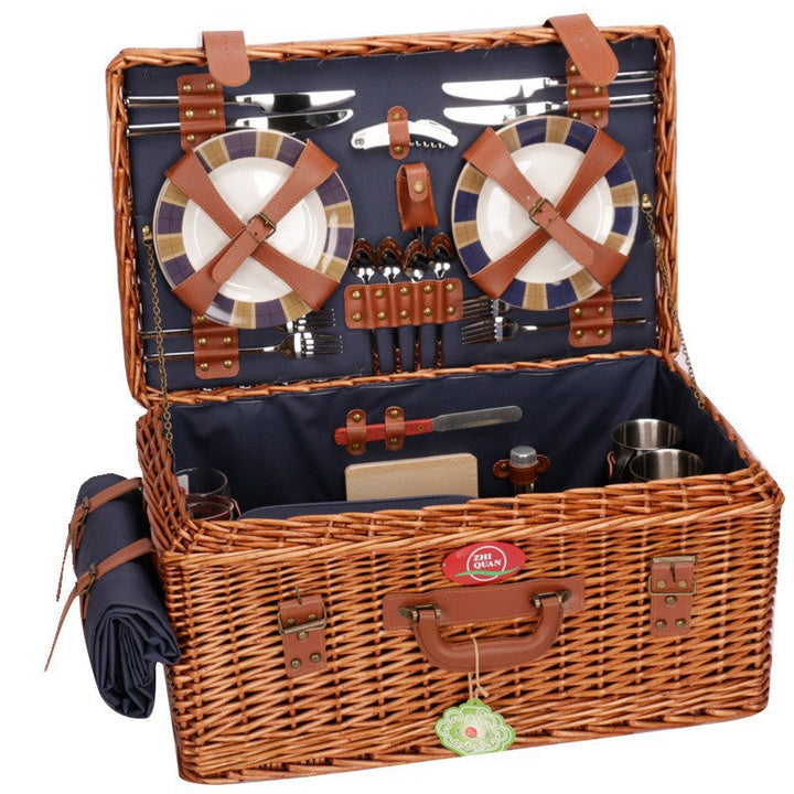 Elegant women's outdoor dining basket: luxury picnic set with insulated cooler and quality crockery.