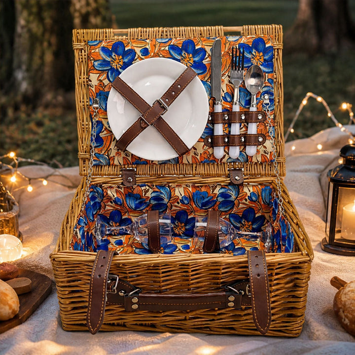 Women's luxury picnic basket including plates, cutlery, glasses & insulated cooler for outdoor feasts.